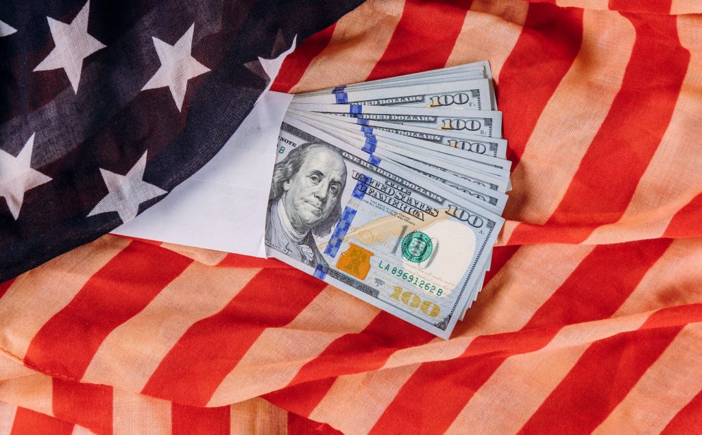 US dollars wrapped in the US flag