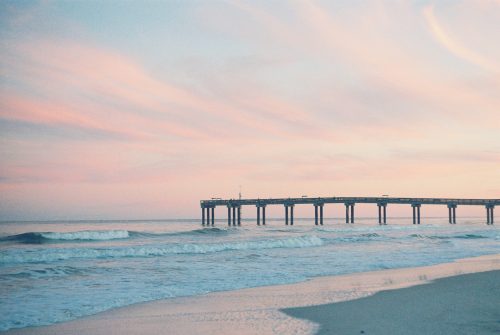 pier-sea-against-sky-sunset-min