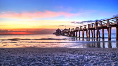 scenic-view-beach-against-sky-sunset-min